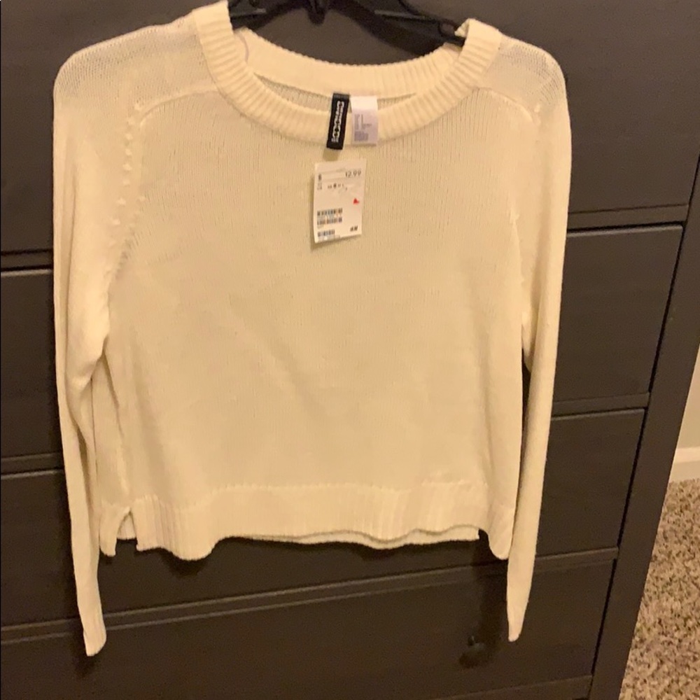 Fine knit sweater.